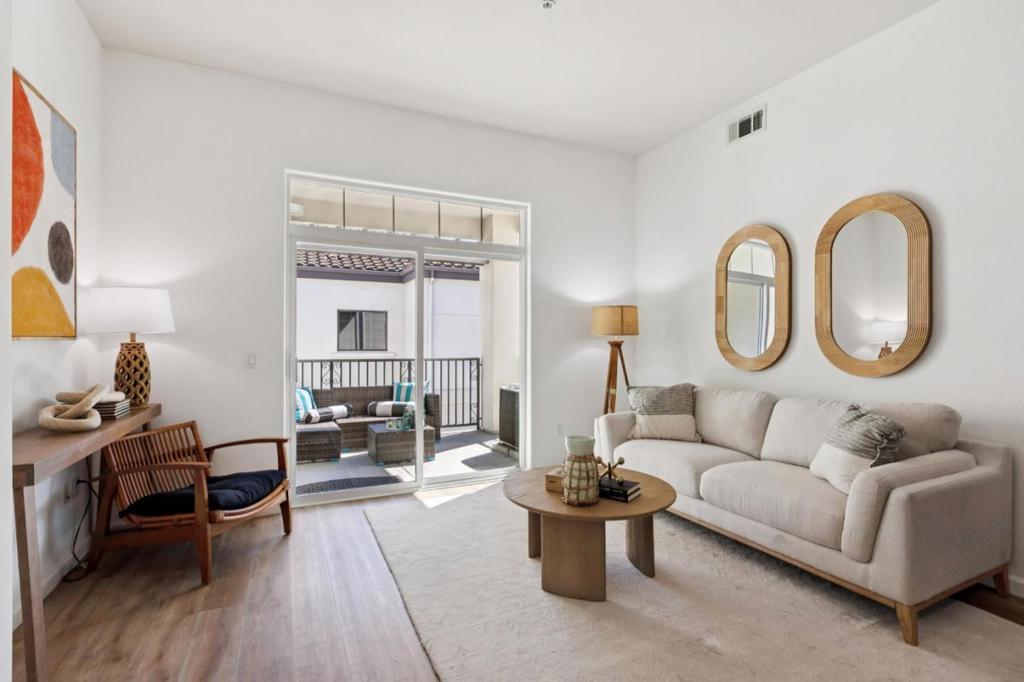 Gorgeous newer 2-bedroom, 2-bath condo in the heart of Cupertino! This upstairs unit boasts soaring ceilings and abundant natural light, creating a bright and airy living space. A lovely private balcony offers the perfect spot to unwind with your favorite beverage. Tucked away in a quiet interior location, youll enjoy peace and privacy away from traffic and noise. For added convenience, the community is equipped with an elevator and the unit comes with two underground parking spaces. Perfectly situated, its just minutes from Target, grocery stores, restaurants, coffee shops, top schools, major employers, and easy freeway access. It is a wonderful home for first time home buyers who want to send their kids to Cupertino schools, grandparents who want to live near family or investors who love a great rental property! Don't miss it!