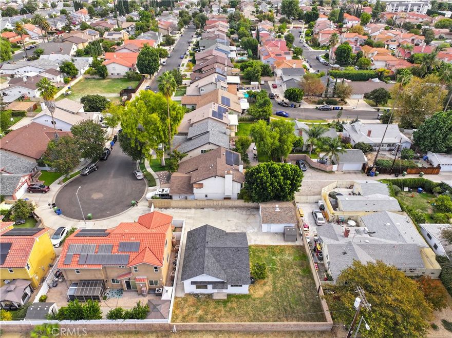 A beautifully updated home offering comfort, privacy, and endless potential. Nestled on a quiet cul-de-sac and recessed from the street for added privacy, this charming residence sits on a huge lot with room to grow. The long driveway provides plenty of space for multiple cars or RV parking, leading to a two-car garage, perfect for an ADU conversion or future expansion. This home has been tastefully refreshed inside and out with new siding, a new roof, fresh interior and exterior paint, and new hard-surface flooring throughout. The recently updated kitchen offers a clean, modern feel and opens to bright living spaces filled with abundant natural light. The newly renovated bathroom adds a stylish touch, while central heating and cooling provide year-round comfort.Enjoy the spacious side and backyard, ideal for entertaining, gardening, or adding onto the home. Laundry hookups are conveniently located in the garage, adding everyday practicality. Homes located on a cul-de-sac offer added privacy and a peaceful environment with minimal traffic,perfect for families or anyone who values seclusion. Located near Pierce College, Topanga Mall, The Village, and other shopping and dining establishments, 20464 Elkwood Street delivers a rare blend of move-in readiness, space, and future potential, perfect for homeowners and investors alike.