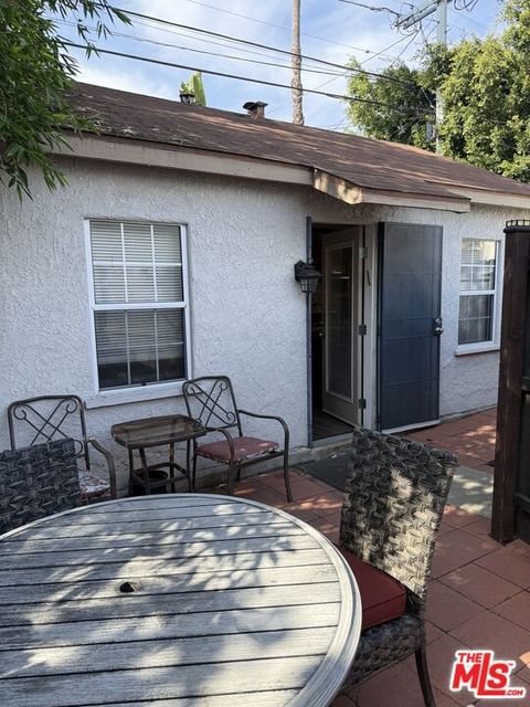 Photo of 1465 1/2 S Durango Avenue #1/2, Los Angeles, CA 90035 (MLS # 25618131)