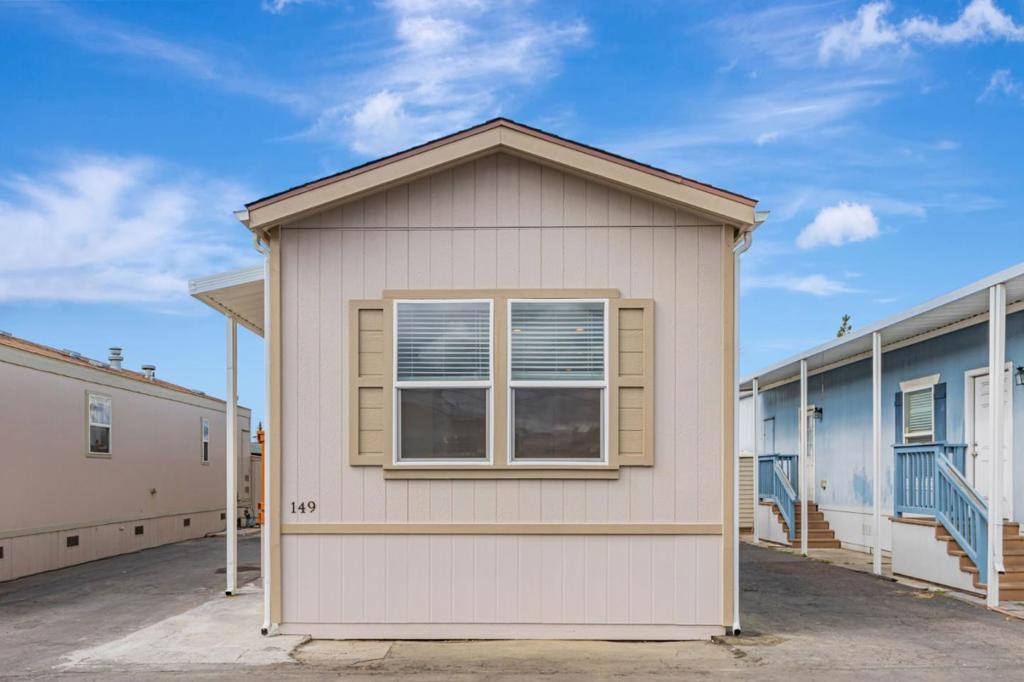 Price Improvement and SPACE RENT REDUCTION TO ONLY $1,195! This property now offers even more value in today's market. Featuring a brand-new 2025 mobile home with low space rent, a central location, and move-in readiness, this home is the perfect blend of comfort and convenience. Discover modern living in this charming 2-bedroom, 1-bathroom home located in the vibrant city of San Jose. Built in 2025, this never-occupied Clayton home is in pristine condition and offers 745 sq. ft. of thoughtfully designed living space. The kitchen comes fully equipped with a dishwasher, garbage disposal, microwave, oven range, and refrigerator, making meal prep both easy and convenient. Dine in the cozy eat-in kitchen or enjoy meals in the dining area that flows seamlessly into the living room. Durable vinyl/linoleum flooring throughout ensures both style and practicality, while energy-efficient double-pane windows and Energy Star appliances help keep utility costs low. Laundry is hassle-free with dedicated hookups. Located within the Alum Rock Union Elementary School District, this home is close to schools, shopping, dining, and major commuter routes, offering the perfect balance of convenience and lifestyle. Embrace a low-maintenance, comfortable lifestyle with this delightful San Jose home!