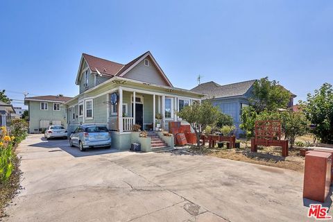 Photo of 805 E 21st Street #1st floor, Los Angeles, CA 90011 (MLS # 26639923)