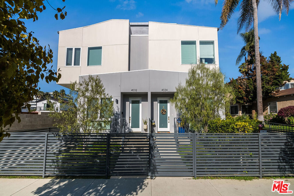 Incredible designer done unit in the heart of the Carlson Park neighborhood of Culver City. Located in one of the city's most convenient and highly sought after locations, this newer construction modern townhome is sure to impress even the most discerning of clientele. Boasting open floorpan and soaring ceilings, this private and luxurious unit is outfitted with high end designer finishes and features private patio, stunning rooftop deck, and a private controlled access garage with direct access to the unit. The kitchen is a chef's dream with ample quartz countertops, tiled backsplash, stainless steel appliances, and a large built-in pantry. The expansive dinning and living areas flow seamlessly to the private outdoor patio - perfect for grilling with the family and sleepy days in the sun for your furry friends. Upstairs are 3 well appointed bedroom suites including primary suite with luxurious bathroom and a fully outfitted walk-in closet. Additionally, the unit features an incredible private and spacious rooftop deck overlooking downtown Culver City. Perfectly situated on a quiet, tree-lined street just moments from all the amazing shopping and dinning that Downtown Culver has to offer - truly a must see property!