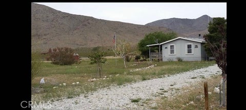 Photo of 20553 Nearbank RD, Lucerne Valley, CA 92356 (MLS # IV26099541)