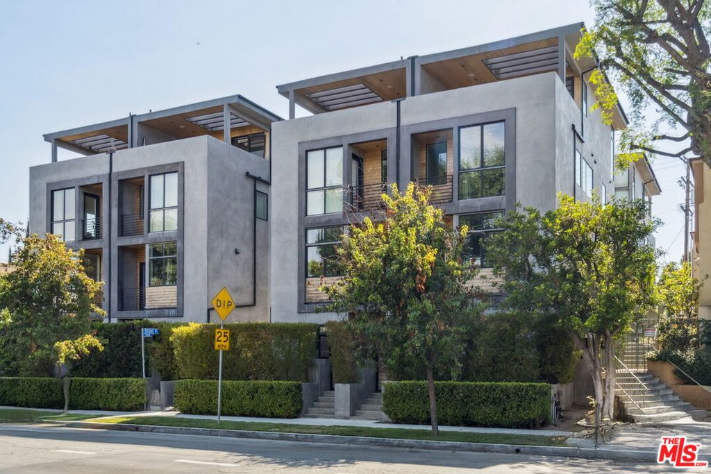 Perhaps Studio City's most convenient location for California lifestyle at its best. Uniquely designated as Small Lot Single Family Home offers the privacy of single-family living but the security and ease of Townhouse living. It's like the best of both. Built recently in 2020, this large 4Br/5Ba plan offers beautiful 7 1.2" wide European Oak flooring placed above sound insulating " cork throughout. The open modern Kitchen appliances are imported Italian design Bertazzoni surrounded by beautiful quartz surfaces. Front and Corner unit for additional peaceful home environment and sun-filled rooms on 3 sides. Enter either from Direct Entry Garage or through front garden terrace with its large firepit outdoor lounge. Every bedroom is a suite with its own bath. There is also a guest Powder room off the main entertaining living space & kitchen. Top floor is for entertaining grandly, opening to a huge mountain-facing covered terrace. There is also a full bath on this level, in case of a sleepover guest. Refreshment station with fridge & catering counter is a handy amenity for Super Bowl Sundays or awards night festivities. Perfect as a screening room for large groups as well. Spacious interior laundry area, central air conditioning & heat, Convection Oven, Microwave, Gas range, Ice Maker are all some of the additional special features at this luxury residence. Walk to the charming Tujunga Village shopping & restaurant destinations less than 1 block away.