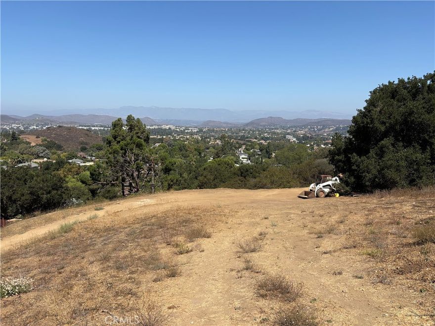 Quiet Spectacular pastoral mountain and city lights view. Quiet street several minutes from freeway. Surrounded by multimillion dollar homes. Must see in person to capture the aerial perspective