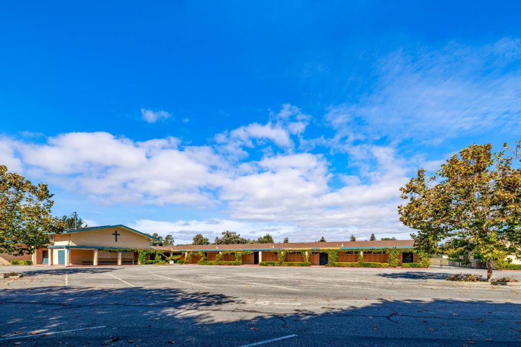 Former home of Good Shepherd Catholic School and resting on 9+ acres in Santa Cruz, California, this 24,000± sq ft facility is ready for transitioning. Currently zoned PF (Public Facility) - some conditionally allowed uses may include affordable housing, schools, colleges, offices, clinics, laboratories, hospitals, nursing homes, residential care facilities, day care facilities. Good Shepherd School is outfitted with solar panels and consists of four modular buildings, gymnasium, kitchen, library, administrative offices, and a large sports/activity field. A commercial property of this size and centrally located near schools, shopping, and medical facilities is rarely available within the Monterey Bay area. Explore the possibility to reinvent this extraordinary opportunity into something that can benefit the communities in the surrounding areas. An ideal investor match.