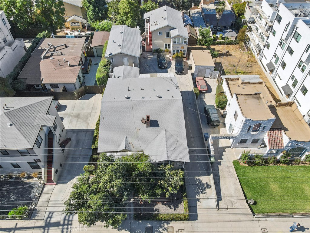 R3 ZONED SILVER LAKE GEM – SIX UNITS + DEVELOPMENT POTENTIAL!!! Unlock exceptional value and future opportunity with this rare income-generating 6-unit property in the heart of Silver Lake, one of Los Angeles’ most coveted and vibrant neighborhoods! Just a short stroll from the scenic Silver Lake Reservoir, lush meadows, and the community-favorite dog park, this property delivers the perfect fusion of urban convenience and natural tranquility. Nestled on a generously sized, verdant lot, the grounds are dotted with mature, fruit-bearing avocado, fig, and lime trees, creating a serene retreat for tenants and owners alike. Each of the six units is individually metered for utilities, ensuring straightforward management and maximizing profitability. Recent upgrades include energy-efficient dual-pane windows, enhancing interior comfort and lowering utility costs. The property also features five covered carport spaces and two additional uncovered parking spots, offering a total of seven on-site spaces—an increasingly rare and valuable amenity in the area. The upper rear unit boasts lovely pocket views of Silver Lake and the iconic Griffith Park Observatory dome, offering a unique and desirable perspective of LA’s most iconic landmarks. Zoned R3, the property holds tremendous upside: there’s potential to build up to six additional units (for a total of 12), offering long-term equity growth and significantly expanded rental income potential. Whether you’re a seasoned investor or an owner-user, the flexibility is unmatched—live in one unit and let the other five help pay your mortgage! Just minutes from Downtown LA, less than 2.5 miles to Dodger Stadium, and within walking distance to Silver Lake’s top-tier retail and culinary hotspots—including Gelson’s, Whole Foods, Silverlake Wine, Trader Joe’s, and the iconic Red Lion Tavern—this is truly a can’t-miss opportunity in one of LA’s strongest rental and lifestyle markets. Schedule your private showing today and take the next step toward exceptional returns in a near-unbeatable location!