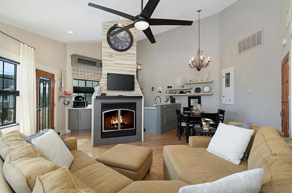Beautiful 1 bedroom Condo Furnished and includes utilities just steps from the shore, pier and popular Seacoast Drive. A rare one bedroom with a private stairway entry and west facing patio. Vaulted ceilings and the open floor plan are enriched by an abundance of natural light. Updated throughout and ready for long or short term. One of only four units in this property 1 block from the beach. It offers privacy, storage, washer/dryer and parking.