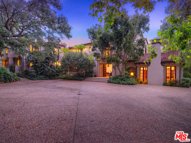 Welcome to "The 580" A Legendary American Castle Estate steeped in Hollywood Fame. Distinguished Holmby Hills compound, behind gates on appx. 1.65 landscaped acres. Exquisitely maintained (extensively renovated cira 2003-4) Main house feat. timbered cathedral ceilings, handcrafted wrought iron & painted tiles, hrdwd flrs. 2-story chandelier entry, grand living room w/ trussed ceiling, fireplace, Juliet's balcony, courtyard & gardens. Gorgeous master w/ barrel vaulted ceiling, fireplace, sitting area, office, walk-in closets & lavish spa-style bath. Formal dining & breakfast room, family room, library/study, Home Theatre (formerly a Bel-Air "Circuit" Projection Theater), game room w/ bar, lounge & refrig wine cellar, art studio, playroom, staff quarters w/ catering kitchen outdoor living loggia. Detached 1-bedroom GH w/ kitchen, n/s tennis court w/ pavilion, pool, spa & pool cabana, bball court, flat lawns & play ground, rose gardens, motor court, 2-car porte-cochre, 3-car garage.