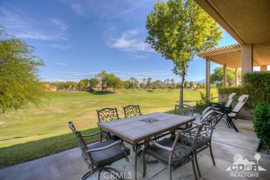Enjoy stunning golf course and mountain views from this light & bright home in the guard-gated Mission Hills Country Club Deane Homes. Located on an elevated setting above the 6th fairway of the Pete Dye Resort Course is this perfect golf retreat. Inside the 1,620sf is an open Great Room with views of the golf course and direct access to the rear-covered patio. The kitchen features sleek white cabinets, tile counter tops and a huge window with striking views! The Master Suite is very spacious and has 2 closets, over sized bathtub and tile shower. The Guest Bedroom includes a convenient en-suite bathroom and the 3rd bedroom is currently used as a den/office. This convenient location is a short golf cart ride to the Westin Resort Starbucks & Restaurants, heated community pool & spa and the Mission Hills Clubhouse. The Bonus is the Golf Cart is Included! This property is being offered turnkey furnished and is ready for you to move right in and start enjoying today.