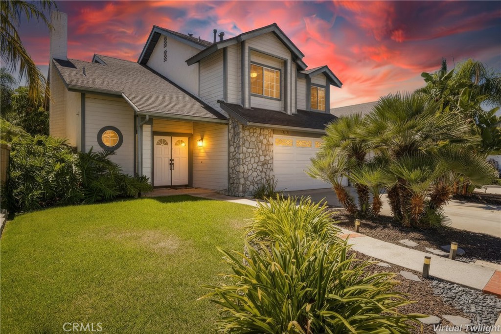 Gorgeous single-family residence, remodeled kitchen and baths, beautifully updated, and ideally located on a quiet cul-de-sac in the desirable Meadowwood Homes community. The charming curb appeal and a well-maintained exterior creates a welcoming first impression. Step inside through the double door entry and soak in the light filled interior boasting sleek luxury vinyl plank flooring throughout the main level, Plantation shutters, soaring vaulted two-story ceilings, a neutral paint palette, and an abundance of natural light creating an ideal living environment. The living room is an elegant space for gatherings around the beautifully updated fireplace. Step through to the “Great Room,” an ideal open concept living space with a flexible family room space open to a dream kitchen with direct access to the backyard patio creating a superb indoor-outdoor living space for relaxing and entertaining friends and family. The sparkling kitchen has been stylishly updated with timeless white shaker cabinetry, deep stainless-steel sink, updated faucet and fixtures, subway tile backsplash, stainless steel appliances, extra storage cabinetry and open shelving built-in, and a prized breakfast bar open to a sunny breakfast nook overlooking the tranquil backyard. Travel up the light filled stairway to the primary bedroom suite with double door entry, plantation shutters, vaulted ceilings, walk-in closet, and a gorgeous remodeled primary bath with sleek contemporary Quartz topped dual vanity, updated faucets and fixtures, framed vanity mirrors, updated custom lighting, and a spectacular step-in shower enclosure with custom tile surround, rainfall shower head, and frameless glass enclosure. Two guest bedrooms and a beautifully updated guest bathroom completes this superb floor plan. The backyard is a private oasis with a large, covered patio area, raised planters, lush Tropical landscaping, and a green grassy lawn, perfect for relaxing and BBQing with loved ones. Just a short stroll to two private gated community parks with spectacular panoramic mountain views, playground, basketball court, playing fields, and picnic areas. Close to Irvine Spectrum, shopping and dining, easy 5 Freeway and Toll Road access, just minutes from an abundance of outdoor activities and hiking through nearby Whiting Ranch Wilderness Park and Lake Forest Sports Park, and minutes from local beaches.