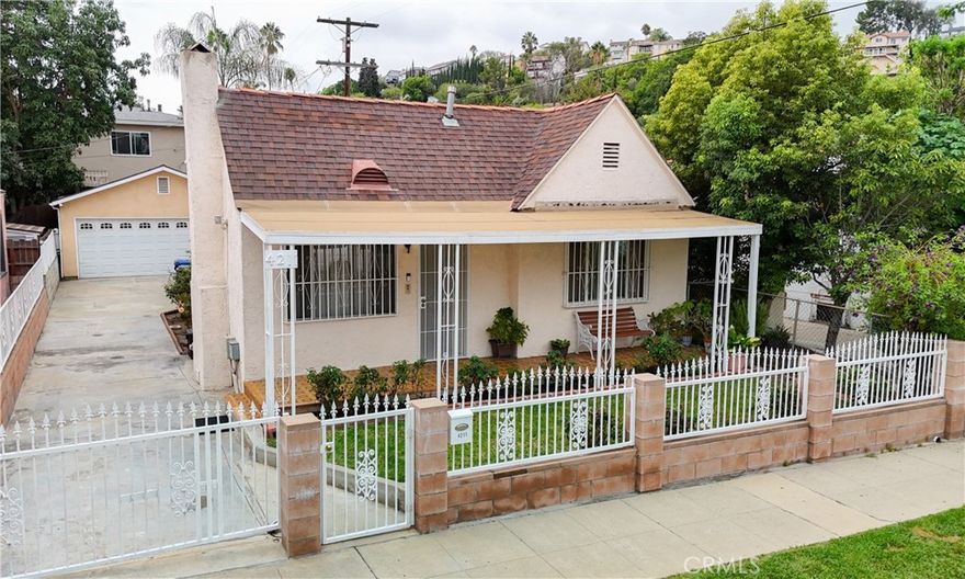 Welcome to 4211 Lowell Drive in Los Angeles!

Nestled in the heart of El Sereno, this charming single-story home offers 3 bedrooms and 1 bathroom with a warm and inviting layout perfect for everyday living(Property profile shows 2 bedroom 1 bathroom, 3rd room can be used as bedroom).



Step through the front gate into a lush, fenced front yard with a cozy covered porch — an ideal spot for morning coffee or relaxing evenings. Inside, the living room features fresh paint, updated flooring, and a classic fireplace, creating a bright and welcoming space.



The spacious kitchen provides ample cabinetry, granite countertops, and a functional layout, ready for both home cooking and entertaining. Bedrooms are generously sized and filled with natural light, while the bathroom features clean tiled finishes and a walk-in shower.



Outside, enjoy a large driveway with gated entry, a detached 2-car garage, and a private backyard with mature trees — offering room to garden, play, or create your dream outdoor retreat.



Conveniently located near Cal State LA, shops, eateries, and freeways, this home provides easy access to Downtown Los Angeles, Pasadena, and beyond.



Whether you’re a first-time buyer or an investor looking for opportunity, this property is full of potential and ready to welcome its next owner. You don't want to miss out!!