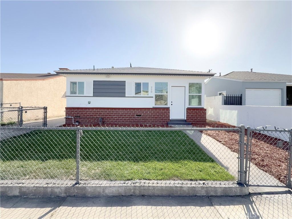 Photo of 220 W 98th Street, Los Angeles, CA 90003 (MLS # IG26076248)