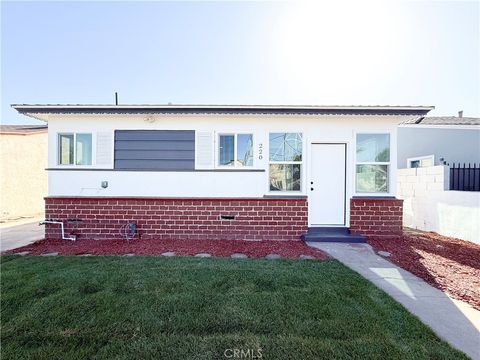 Photo of 220 W 98th Street, Los Angeles, CA 90003 (MLS # IG26076248)