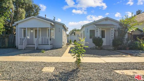 Photo of 920 W 3rd Street, Pomona, CA 91766 (MLS # 25622381)