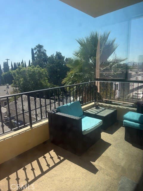 Photo of 6938 Laurel Canyon Blvd #212, North Hollywood, CA 91605 (MLS # RS26084318)