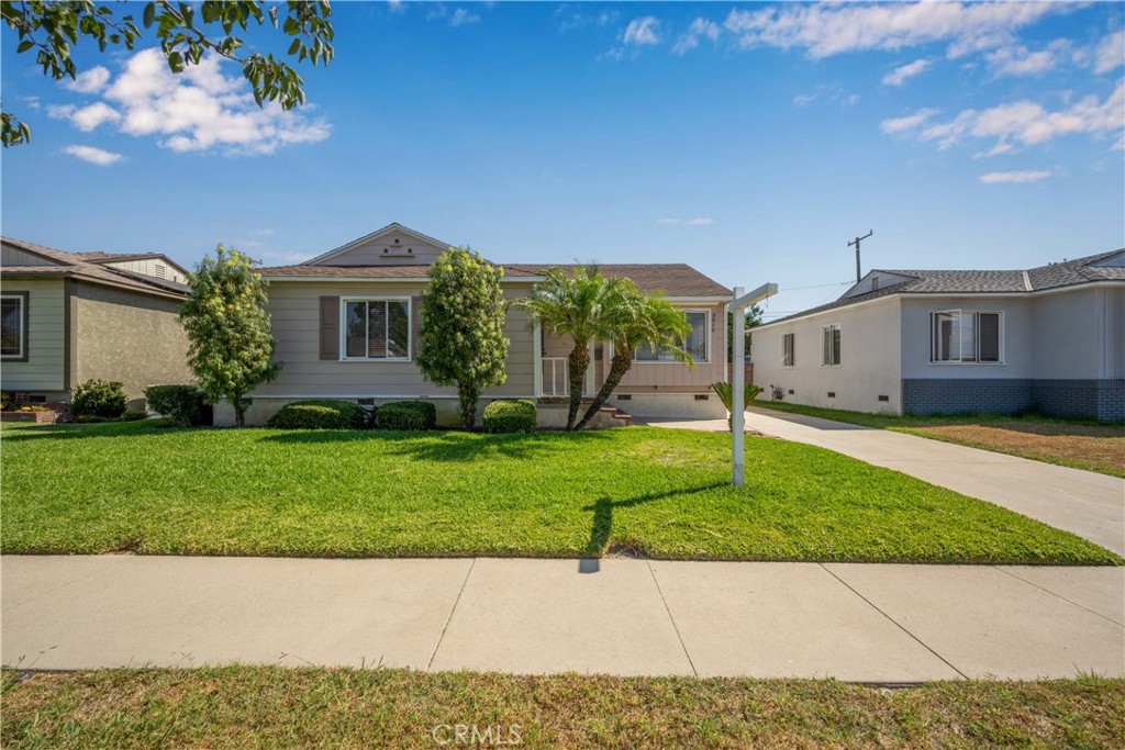 Don't miss this wonderful opportunity with this expansive Carson Park charmer...Located just a short walk from Patrick Henry Elementary, Marshall Academy Of The Arts and Heartwell Park, this property is a must see. Features include: open kitchen with peninsula counter top leading to the generous dining space and adjacent living room with cozy fireplace, separate laundry room, en-suite primary bedroom which is currently set up as a family room, private backyard with covered patio, detached two car garage with auto opener and a long driveway. With some imagination, this property could easily be a flagship home in this wonderful neighborhood. The quiet interior location is 5 stars, and offers classic mid-century charm with mature trees and well kept homes nearby.