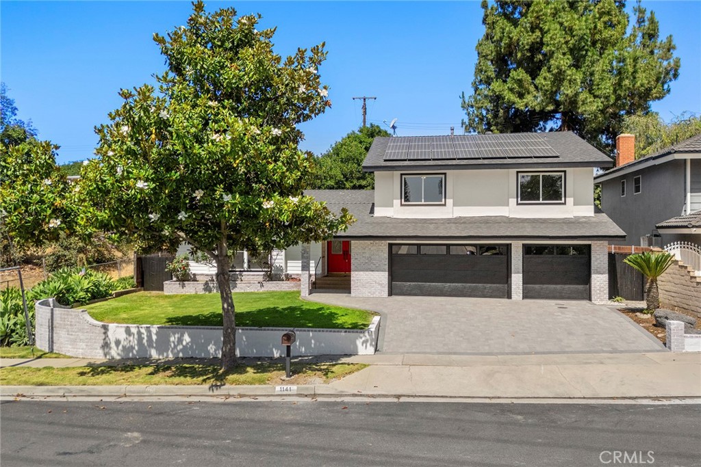 Welcome to your newly remodeled dream home in the highly desirable North Hills community of La Habra, where charm, convenience, and curb appeal come together in all the right ways. Located just a 30-second stroll to a beautiful park with playgrounds, open greenbelts, and plenty of space for parties and community gatherings, this neighborhood is known for tons of street parking and a friendly vibe that’s hard to beat. Inside, you’ll find a spacious 4-bedroom, 3-bath layout with thoughtful upgrades throughout. Fresh paint inside and out, ceilings scraped and smooth, fully remodeled bathrooms with American Standard toilets and Moen fixtures. The heart of the home is a remodeled kitchen featuring quartz countertops, a new island/bar area, and stainless steel appliances—ready for dinner parties, pancake mornings, or anything in between. You’ll love the flow of the home with a large family room and an extra den complete with a cozy wood-burning fireplace—perfect for movie nights or curling up with a good book. Downstairs offers the ideal setup for guests, in-laws, or ADU potential, thanks to a bedroom and full bath with its own private entrance. Outside, enjoy your freshly landscaped backyard retreat, complete with new sod, new sprinklers, and even gopher wire to keep your lawn looking sharp. Relax in the shaded back patio—an ideal spot to beat the heat on sunny afternoons. And let’s not forget the curb appeal: a brand-new paver driveway, new garage doors, and a 3-car garage seal the deal. This home has it all—style, space, and location. Don’t miss your chance to make it yours!