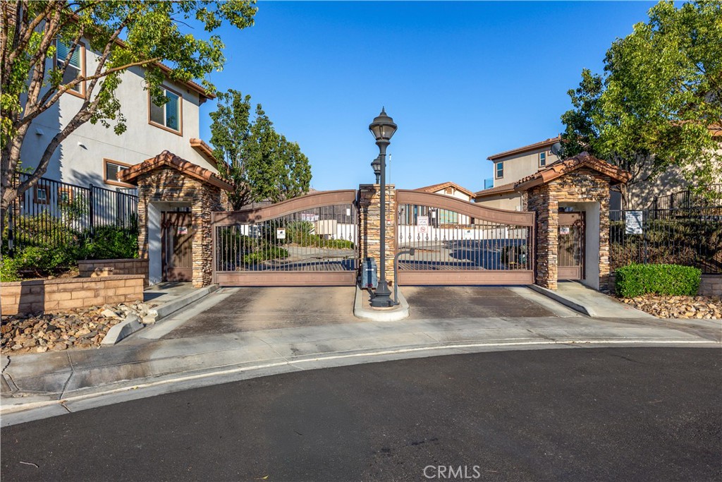 This GORGEOUS former model home is located in the Exclusive and Highly Desirable Community of Rocky Point in Canyon Crest. The community is gated, family friendly and offers residents a community pool, spa and club house. As a former model home it has all the amenities you desire. Rocky Point is a 5 minute drive to UCR, a 5 minute walk to Canyon Crest Towne Center and close to downtown Riverside. The Towne Center includes Ralph's Grocery Store, Banks and favorite eateries like Starbucks, Subway and Bushfire Kitchen and many others. Enjoy sunset and hillside views from the great room, kitchen and master bedroom. Beautiful travertine flooring in the foyer, kitchen and bathrooms. Newer carpet, granite countertops and custom cabinetry throughout. One bedroom and full bath downstairs along with half bath in foyer and laundry room also downstairs. Upstairs is GRAND MASTER bedroom with jacuzzi tub and fireplace. Second upstairs bedroom has double sinks in full bathroom. All front landscape is maintained by HOA. No Mello Roos.
I could go on and on about this amazing property however I will let the photos and video tell the rest of the story. Oh I almost forgot to mention that this property is designed to accommodate an elevator if that is something needed down the line.