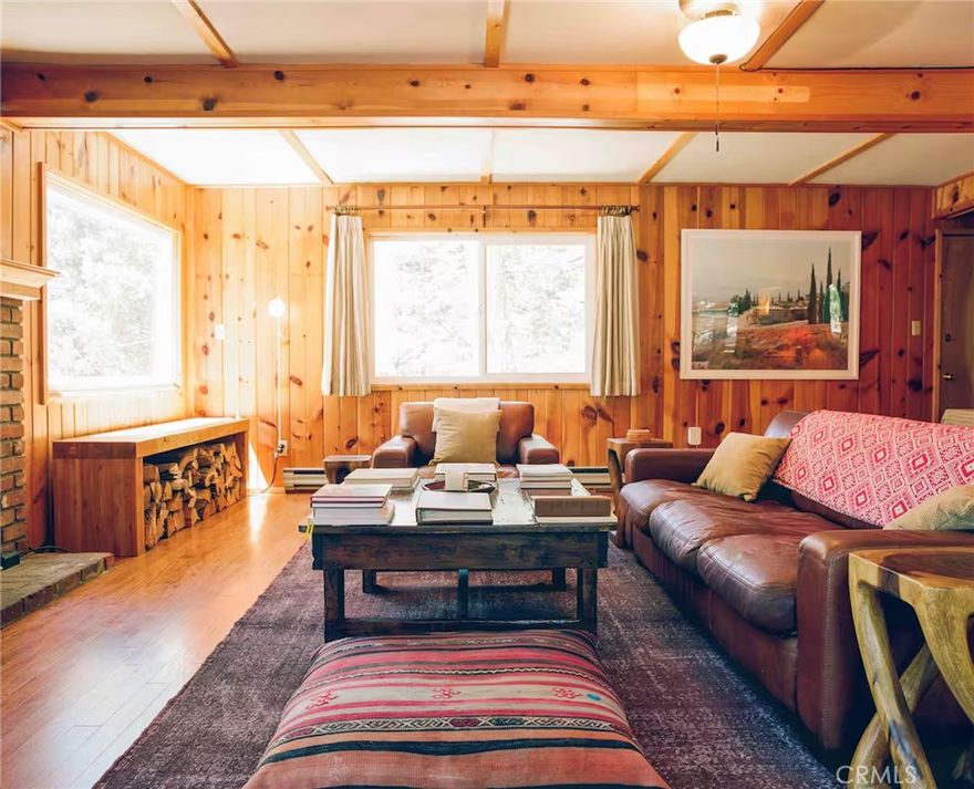 Welcome to Little Sequoia. A beautiful cabin nestled amongst the pine trees of the Sequoia National Forest in Wofford Heights at approximately 5,500ft elevation.  Enter to a tastefully furnished open living space lined with pine tongue & groove walls, oak hardwood floors, ceiling fan & wood burning fireplace.  Breakfast nook, kitchen w/ a vintage oven, washer/dryer & all your cookware essentials.  Bathroom has stand up shower lined w/ embossed mid century tile by Pomona.  Upstairs to the loft style bedroom w/ pine tongue groove ceilings & plenty of closet space.  Cozy second bedroom w/ a king size bed, ceiling fan & ample closet space.  Exit to the patio w/ a plethora of space to enjoy your mountainous view & BBQ.  Detached garage & screen enclosed utility space to chop your wood for your fire.  7 miles down to Lake Isabella.  11 miles to Kernville for culture & hospitality, Ewings, Kern River Brewing Co, Big Blue Diner, Sportsman’s Inn & McNally’s Outpost are just a few of many to mention.  Venture further & find your private swim hole on the historic Kern River.  An excellent opportunity to take over a well embraced short term rental business with wonderful reviews and/or have your own private tranquil getaway.  Fully furnished ready for your mountainous retreat in Alta Sierra.