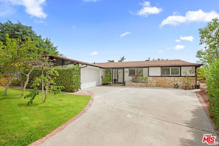 Welcome to this beautifully remodeled single-story residence tucked away on a private cul-de-sac, offering sweeping city light and mountain views. Situated on an expansive 35,000+ sq ft lot, the property features a sparkling flagstone pool and spa, with spacious patio areas for outdoor dining and entertaining. Inside, the home boasts 4 bedrooms with newer flooring and 3 updated bathrooms. The living room features recessed lighting and tile floors, while the formal dining room captures breathtaking views. The kitchen showcases whitewashed cabinetry and tile accents, with seamless flow to the outdoor spaces. Located in the sought-after El Camino Real Charter, Hale, and Pomelo Charter school district, this exceptional home offers comfort, style, and convenience, all within close proximity to parks, shops, and dining. Don't miss the chance to lease this West Hills gem!