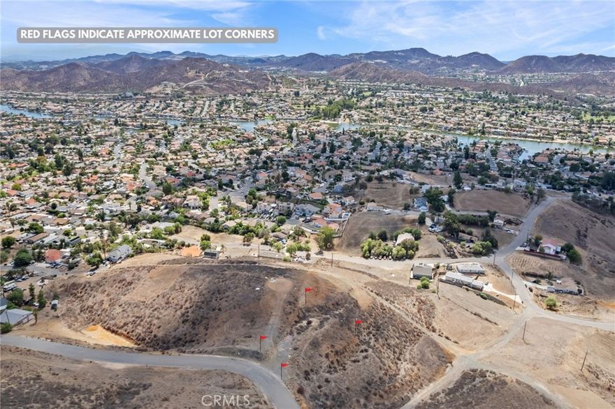 SPECTACULAR OPPORTUNITY!! Build your dream home on this generous 10,454 square foot parcel, perfectly situated in a rapidly developing neighborhood of Menifee and offering sweeping views of Canyon Lake and the surrounding foothills. This vacant lot combines size, serenity, and accessibility in one rare offering. The property features a gently elevated topography that captures the lake, canyon, and sunset scenery from many vantage points. Paved road frontage provides convenient access, and utilities such as water and electricity are located nearby or at the street (buyer to verify with the city).
The parcel is located within the Menifee city limits, just minutes from Canyon Lake, allowing you to enjoy the tranquil beauty of the area while staying close to shopping, schools, parks, and freeway access for an easy commute. This lot is zoned as R1 single family residential - making it an excellent choice for a custom home build.  Whether you are an investor seeking a prime development opportunity or a homeowner ready to create a private retreat, this property offers tremendous potential. Buyer to verify all information including utilities, zoning, permitted uses, and building requirements. Lot is sold “as is.”