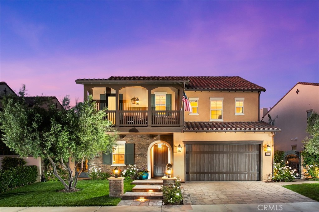 A Rare Offering in Coveted Pacifica
Step into the essence of refined coastal living in this exceptional 2018 Taylor Morrison home—an inspired blend of timeless design and contemporary luxury. With over $250,000 in thoughtful upgrades, every inch of this residence reflects quality and care, from the soaring 10-foot ceilings to the wide-plank hardwood floors that run throughout. The versatile floorplan includes a main-level guest suite with its own private entrance and patio—an ideal retreat for multigenerational living or long-term guests. The formal dining room opens to a second, serene courtyard patio, where the gentle sound of a custom fountain sets the tone for effortless entertaining. At the heart of the home, a chef’s kitchen stuns with a dramatic 14-foot island, built-in refrigerator, 6-burner stove with griddle, double ovens, a walk-in pantry, and a bright breakfast nook with views of the lush backyard. Custom soft-close cabinetry, a built-in coffee station, and high-end finishes make this kitchen as functional as it is beautiful. The family room—true to Taylor Morrison’s signature style—offers generous space for gatherings, centered around a sleek gas fireplace with a 70" mantle. Expansive telescoping glass doors open wide to reveal a backyard oasis filled with blooming rose gardens, native landscaping, citrus and fruit trees, and even a certified monarch butterfly habitat. The spacious lawn is perfect for play or ready to welcome a future pool. Upstairs, the primary suite feels like a private retreat with a large deck offering sweeping views of the gardens and sunrise skies. The spa-like primary bath is a showpiece all its own—complete with a freestanding soaking tub under a glimmering chandelier, oversized shower with bench, dual vanities, and an enviable walk-in closet with custom California Closets built-ins. Two additional bedrooms (including one with ensuite bath), a full hall bath, a generous bonus room, and a well-appointed laundry room complete the upper level. Even the garage has been elevated, with bamboo-topped cabinetry, epoxy floors, EV charging, and dual Rinnai tankless water heaters. A spacious side yard with artificial turf and citrus trees provides the perfect dog run or play space. And as a resident of Pacifica, you’ll enjoy exclusive access to Club Pacifica—with a resort-style pool and spa, cabanas, gym, and scenic trails overlooking Dana Point Harbor.
Homes like this don’t come around often—and they don’t last.