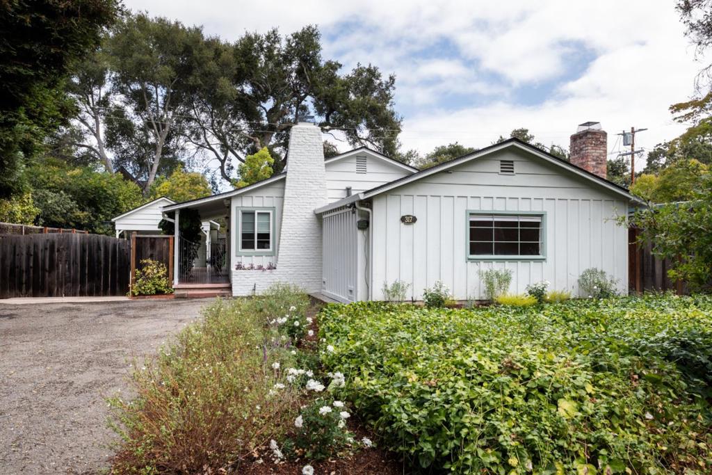 Stylish Single-Story Living on a Spacious Lot Enjoy the rare blend of space and convenience a generous 6,900 SF lot offering privacy while keeping you moments from Menlo Parks best amenities. This updated 3-bed, 2-bath ranch spans approx. 1,470 SF and features hardwood floors throughout most rooms. Cook with ease in a bright, updated kitchen and host indoor-outdoor meals where the dining room opens directly to the private backyard. Recent improvements (20242025): new roof, new lighting, fresh interior paint, and refreshed landscaping. Other updates: kitchen, bathroom, central A/C, dual-pane windows, and custom Shade Store blinds. Two fireplaces add warmth and character, while versatility defines the bonus space. Whether you need a quiet home office, a welcoming guest suite, or a flexible playroom, the bonus space adapts seamlessly to your lifestyle. Tucked behind a gated drive, this home offers a sense of retreat and security, with plenty of parking for family and guests, plus a detached garage/carport. Located on this particularly desirable stretch of Bay Road, directly across from Lindenwood in Atherton, the property presents a rare combination of location, price, and turn-key condition a unique opportunity in todays Menlo Park market.