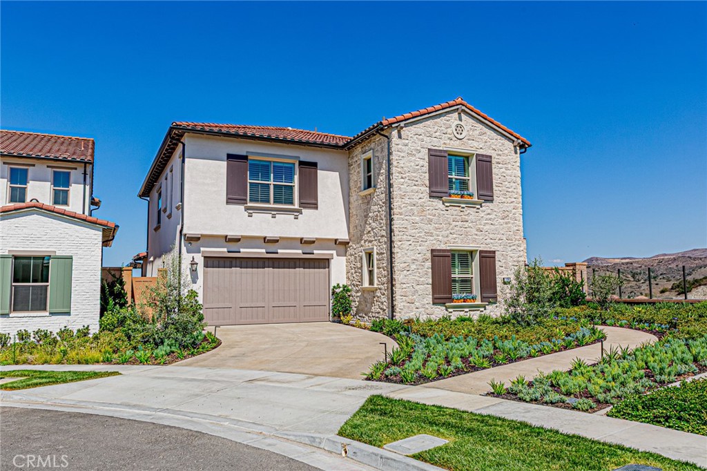 The Most Breathtaking View in Irvine
Discover an exceptional 4-bedroom, 4.5-bathroom residence located in the highly sought-after Portola Springs community of Irvine. Designed for both elegance and comfort, each bedroom is a private en-suite, offering ultimate privacy for family members and guests alike.
The open-concept main level welcomes you with a sun-filled great room and a chef-inspired kitchen featuring quartz countertops, premium stainless steel appliances, and an oversized center island perfect for gatherings and entertaining. Step outside to a private balcony where sweeping mountain and city views stretch endlessly before you—the most stunning panorama you will find in Irvine. Whether enjoying your morning coffee or winding down with an evening glass of wine, this outdoor retreat elevates every moment.
Upstairs, a spacious loft offers versatile use as a secondary living area, home office, or playroom. The primary suite is a true sanctuary, highlighted by an airy layout, walk-in closet, and a spa-like bathroom with both a soaking tub and glass-enclosed shower.
Additional upgrades include designer flooring, recessed lighting, a convenient upstairs laundry room, and a low-maintenance backyard. The community of Portola Springs enhances the lifestyle with resort-style amenities—multiple pools, parks, hiking trails, sports courts, and access to Irvine’s top-rated schools. Easy access to freeways, shopping, and dining ensures convenience at every turn.
This is more than a home—it’s a rare opportunity to own the most beautiful view home in Irvine.