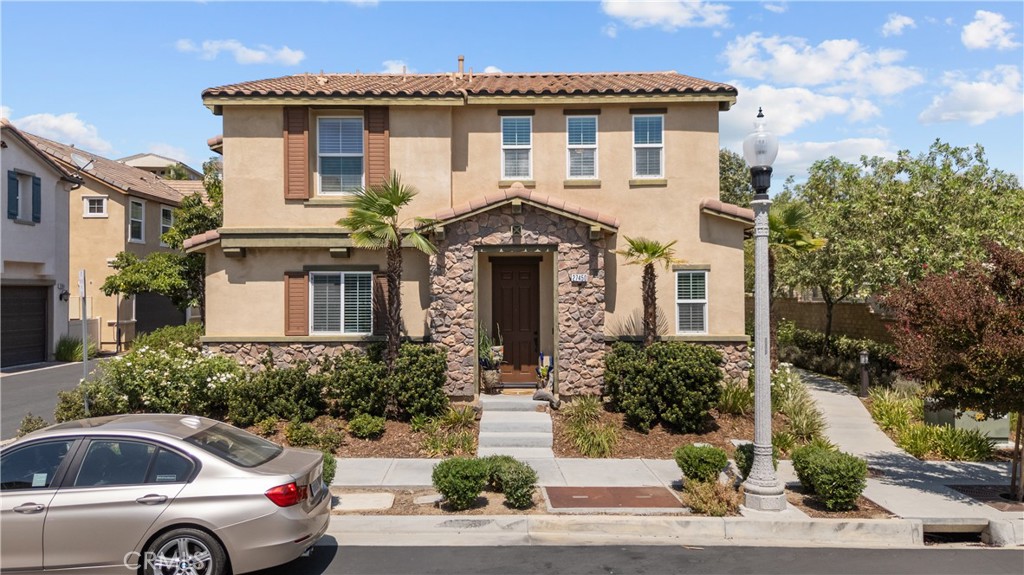 Welcome home to this beauty! Located in the wonderful Five Knolls community of Santa Clarita, this 4-bedroom, 3-bathroom detached home with no common walls offers 1,895 square feet of smart, functional living space in one of the neighborhood’s most convenient locations—walk right up from the street with no shared driveway. The open floor plan includes a downstairs bedroom and half bath, a kitchen with granite countertops, stainless steel appliances, self-closing drawers with pullouts, and an oversized island with seating on both sides—great for everyday living or entertaining. Upstairs you'll find three more bedrooms and two bathrooms, including a spacious primary suite with hillside views, a large walk-in closet, and an oversized ensuite bath. The home features energy-efficient upgrades like LED lighting, a tankless water heater, smart thermostats, electric car charger, ceiling fans in every bedroom, and custom window treatments. The attached 2-car garage offers epoxy flooring and overhead storage. My favorite part of the home is the private back patio—ideal for relaxing and space for gardening. The HOA amenities feel like a resort with a pool, clubhouse, and parks steps away from the house. With top-rated schools and freeway access—this one checks all the boxes for comfort, convenience, and community. This home offers all the wonderful features of newer construction, but without the wait for it to be built or the trees and landscaping to grow. Welcome home!