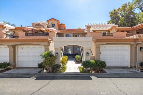 Photo of 25859 Mcbean Pkwy #74, Valencia, CA 91355 (MLS # SR26197305)