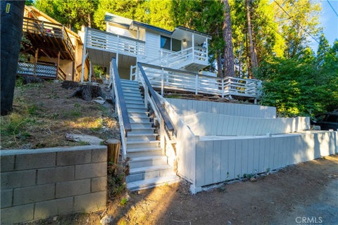 Photo of 744 Woodland Rd, Crestline, CA 92325 (MLS # DW26196802)