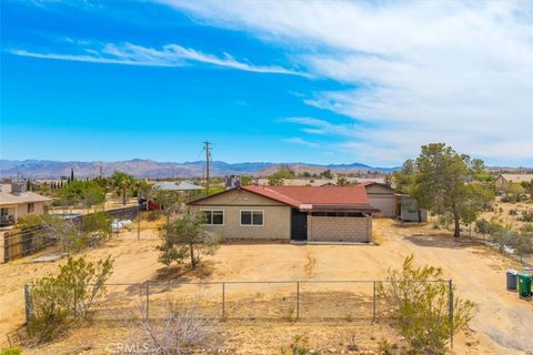 Photo of 58331 Caliente Street, Yucca Valley, CA 92284 (MLS # JT25276651)