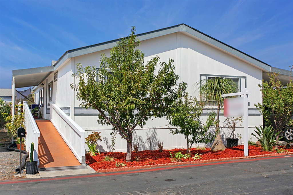 This bright and spacious mobile home welcomes you to enjoy the spacious formal living room with vaulted ceilings, sky lights and ceiling fan. Private Master Bedroom with a walk-in closet and featuring a spacious Master Bathroom with a soaking tub and separate shower. Home also features two bedrooms and a large private den. The kitchen is bright with sky-lights, stove, microwave and European quartz counters. Yard has fruit trees in the yard can be enjoyed by all. This is a MUST SEE home in North County! Neighborhoods: San Marcos Complex Features: ,,, Equipment: Dryer, Shed(s), Washer Other Fees: 225 Sewer: Sewer Connected Topography: LL