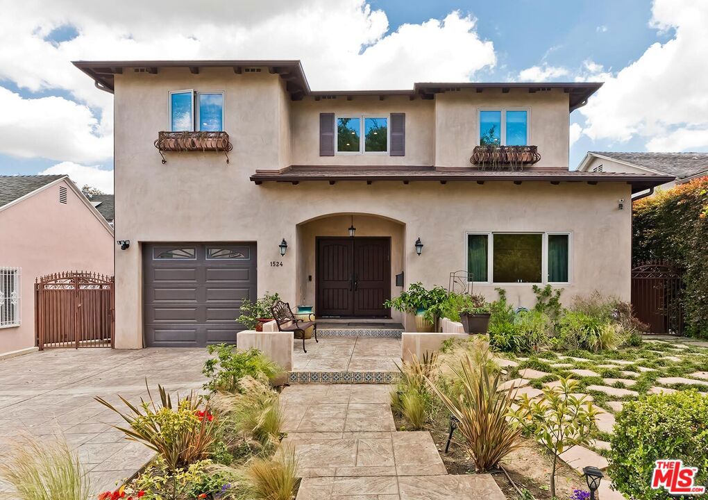 Incredible rental opportunity in a beautiful 6 Bedroom house with pool and spa just outside of desirable Beverlywood HOA. Through the fruit trees of the front yard, a formal entryway leads you to the gorgeous, open layout with classic features and finishes throughout. The first floor boasts a large Dining Room and Living Room with sliding doors out to the patio, great for entertaining, followed by a convenient Breakfast Area and a spacious Kitchen with all the works! 3 ovens, 2 dishwashers, 2 sinks, a walk-in-pantry, stainless steel appliances, Breakfast Bar and a garden window over the sink make this space the true heart of the home. The first floor also features a mud room, light-filled bedroom and full Bathroom. Up the grand staircase to the second floor, which features the Primary suite, 4 secondary Bedrooms, two of which are en-suite, and a convenient office area or library, lined with bookshelves and built-in-desks. The Primary Suite boats views of Downtown Los Angeles, a spa-like bathroom with large soaking tub, stand alone shower, double vanity, built-in linen storage, a large walk-in-closet with custom finishes and a serene reading nook to escape to. The desirable back yard features raised patio off of the Living Room/Kitchen, lower patio, large lawn area, several fruit trees and beautifully tiled pool with waterfall spa elevated above. With deep 2-car garage and additional 2-car driveway, this home has all you need! Conveniently located to Pico Blvd and Beverly Drive, shopping, dining, groceries and Houses of Worship are just blocks away!