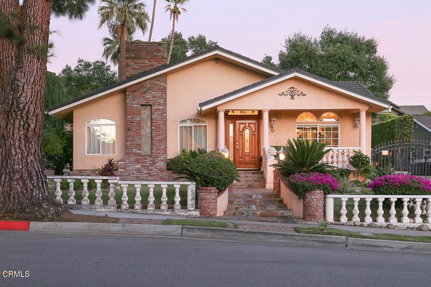 Stunning Mediterranean Retreat in Prime North Monrovia. Step into timeless elegance with this beautifully crafted 4 bedroom, 3 bath Mediterranean-style home with high ceilings, ideally located in the highly sought-after neighborhood of North Monrovia. Designed for both comfort and sophistication, this residence offers a seamless blend of classic charm and modern amenities.Enjoy an inviting living room with a cozy fireplace, recessed lighting, and rich hardwood floors. Host unforgettable gatherings in the formal dining room adorned with striking marble flooring. The expansive, gourmet kitchen is a chef's dream, featuring custom-built cabinetry, built-in appliances, granite countertops, a spacious center island and a secondary kitchen.Unwind in the luxurious primary suite, bathed in natural light from skylights, and indulge in the spa-inspired en-suite bath complete with a jetted tub, separate walk-in shower, dual vanities, and elegant marble flooring.The second bedroom has a skylight with sliding doors that access the side patio with an seating area.Additional highlights include a fire sprinkler system throughout the house and the garage, a surround sound system, 2 central air & heat units, a 2-car attached garage with a large retractable awning, a covered and heated patio perfect for year-round entertaining, and a tranquil backyard oasis with a sparkling pool, multiple sitting areas, a mature oak tree and fruit trees.As a bonus, this property has a unpermitted ADU studio. The 4th bedroom has been converted into an office.House was completely remodeled and  addition was done in early 2000's.
