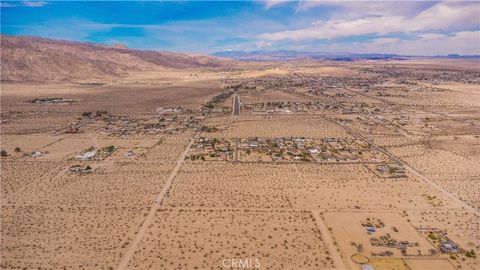 Photo of 3112 Sullivan Road, 29 Palms, CA 92277 (MLS # JT26087456)