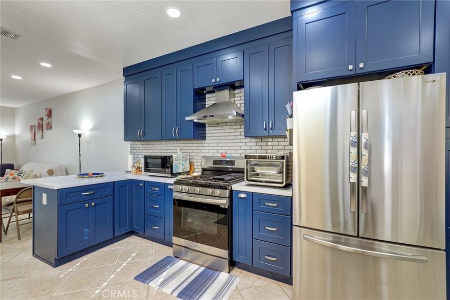 Beautifully updated two-story townhome located in the desirable gated community of Orleans in Aliso Viejo. Step inside to discover a light and open floor plan featuring tile flooring downstairs and luxury vinyl plank upstairs. The completely rebuilt kitchen—from the studs up—showcases all-new cabinetry, stunning quartz countertops, modern backsplash, brand-new stainless steel appliances (refrigerator included), and a sleek stainless-steel farmhouse sink with a built-in glass rinser. The open-concept layout flows seamlessly from the kitchen to the living room, creating an inviting space for entertaining and everyday living.
Upstairs offers two spacious primary suites, each with its own full bathroom, plus a convenient half bath downstairs. Smart features include a Nest thermostat and voice-controlled lighting.
Enjoy the oversized private yard with lush Birds of Paradise in raised planter boxes—perfect for relaxing or hosting gatherings outdoors.

This gated community offers a pool and spa along with rear gated access to Acorn Park and Oak Grove Elementary School, which is just a two-minute walk away. Ideally located near shopping, dining, movie theaters, and entertainment at Aliso Viejo Town Center, plus hiking trails, bike paths, and beaches just minutes away.
***Low tax rate and NO Mello-Roos! Peacefully situated in a quiet interior location with no road noise, this home truly feels like a detached residence offering comfort, privacy, and convenience.