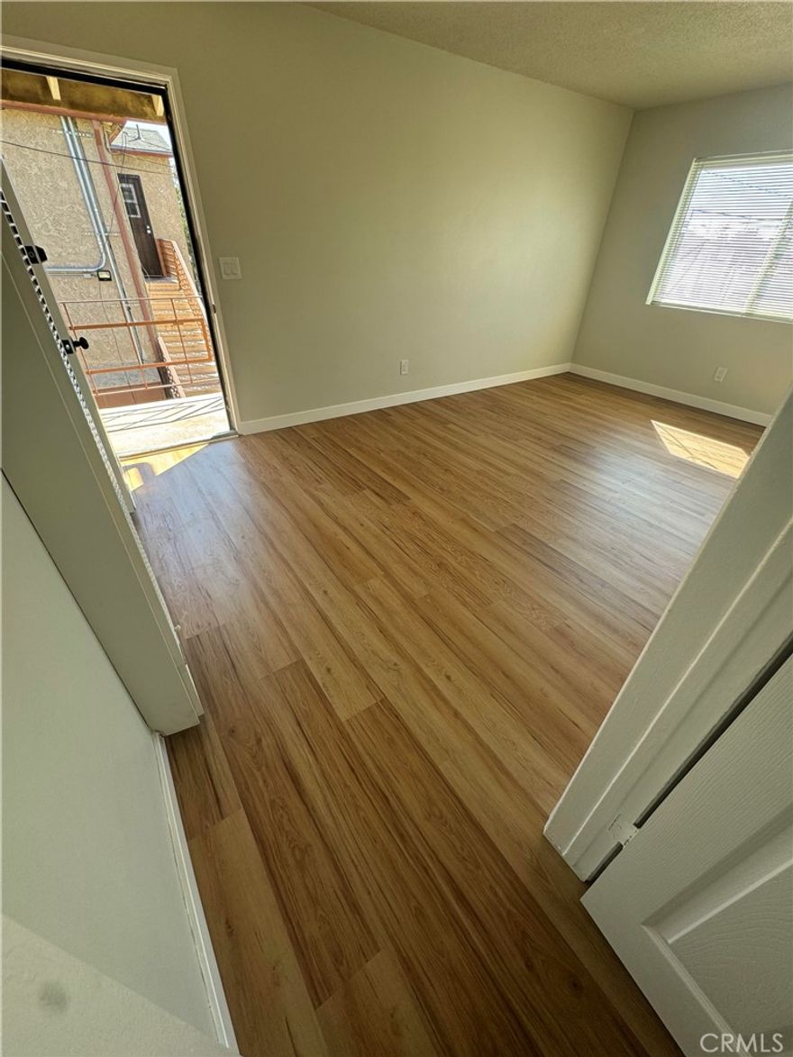 LARGE ONE-BEDROOM UNIT, INCLUDES 1-CAR GARAGE. MAJOR REMODEL OF APARTMENT ALMOST COMPLETE.  RENOVATED KITCHEN WITH NEW QUARTZ COUNTERTOPS, NEW SINK AND GARBAGE DISPOSAL.  ALL NEW BATHROOM, NEW VINYL PLANK WOOD FLOORING THROUGHOUT, NEW INTERIOR PAINT, NEW BASEBOARD, NEW DOORS, NEW LIGHTING...AND MUCH MORE. **EXTRA GARAGES AVAILABLE FOR RENT**