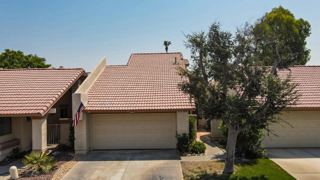 If you're searching for a well-priced home with incredible views overlooking the golf course, this might be the one. This charming two-story condo offers a thoughtful layout perfect for comfort and flexibility.Upstairs, you'll find a private bedroom and bathroom along with a balcony--an ideal retreat where you can take in sweeping views of the mountains, golf course, water, and the lush greenery. It's the perfect perch to relax and watch golfers finish out the hole on the green.Downstairs, there's a second bedroom with its own en-suite bathroom--ideal for guests or for anyone who prefers single-level living without stairs. The home features Spanish tile with striking blue accents, adding a touch of flair and warmth to the interior. Step outside onto the patio and enjoy a panoramic view of the vibrant course, while grilling dinner and enjoying your guest and showing off your views.Whether you're looking to unwind and relax and enjoy quiet time or if you want to stay active and get involved, the community offers it all: regular social gatherings, dinners, dancing, game nights, pickleball, cards, and a dog park. You can stay busy or relax and find peace and comfort from your new home. Whether you want a full time home or a winter condo, Come take a look and see if it's just what you've been searching for.