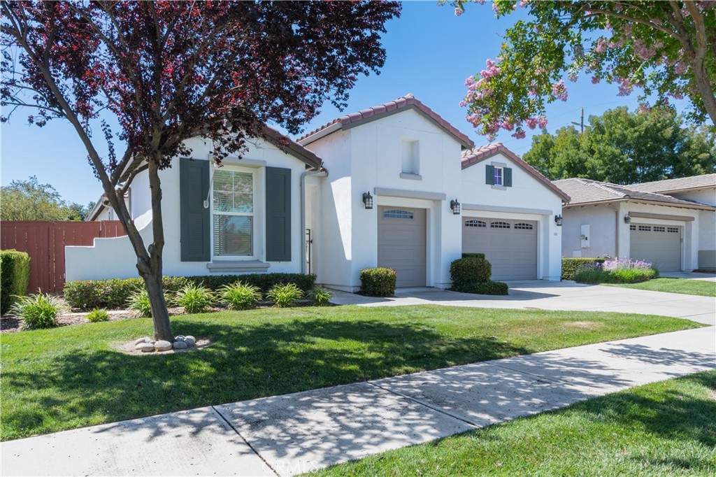 A Beautifully upgraded and maintained residence is located in this prized 55+ community near the center of Paso Robles. This Traditions home of 2330 square feet includes a separate Casita for guests or hobbies. The home of 2 bedrooms, 2 baths plus office has custom upgrades including beautiful, easy maintenance stone flooring, upgraded Alder cabinetry in the kitchen and office, and granite counters. The travertine floored great room is open to dining and kitchen with builtin bookcases and TV nook adjacent to a gas fireplace for cooler days. The spacious primary bedroom with large shutters opens to a bath accented with a jetted tub, roll in shower with stone accents and separate double vanities. All the work has been accomplished outside as you enjoy paved walkways and 2 patio areas for entertaining. Beyond all this, the owned solar system keeps energy bills from being a worry. This lovely community includes gated entry, pool, spa, clubhouse, BBQ area, walking trails and all front yard landscaping managed by the association. What are you waiting for? Come home to Traditions!