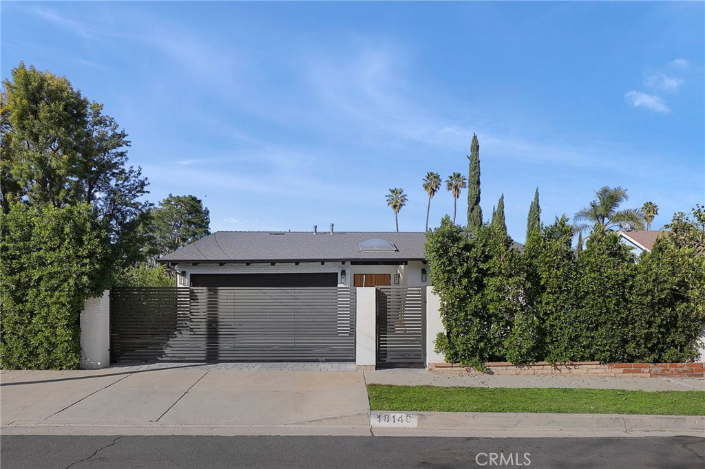 Nestled on a serene and picturesque street in a prime area of Tarzana, this residence boasts three bedrooms, two baths, and encompasses over 1,700 square feet of fully renovated single-family living space. Experience the allure of this elegantly remodeled home, completed in 2024. The open floor plan features a welcoming living room, a dining area, and a beautifully illuminated kitchen, complete with a spacious, meticulously designed island. Enhancing the charm of the home is a dedicated wine closet with glass doors on the side wall.
Each of the three bedrooms is generously proportioned and abundant in natural light, while the master suite is equipped with an expansive walk-in closet and a beautifully renovated bathroom. The backyard features a covered patio and an inviting seating area alongside an open grassy expanse. The property is secured with a gated front entrance, and the two-car garage provides private parking. This home is ideally situated in an outstanding area of Tarzana, conveniently located minutes from the 101 freeway, shopping centers, parks, and additional amenities.