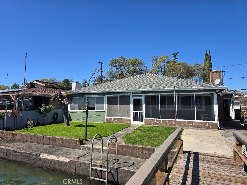 Welcome to your waterfront oasis in Lakeport, CA on beautiful Clear Lake! This charming home boasts a boat dock and lift, perfect for those who love to spend their days out on the water. The manicured yard offers a serene retreat with a fenced yard for privacy and security.
Step inside to find a spacious and open living area complete with a cozy wood stove for those chilly evenings. The dining area is perfect for entertaining guests or enjoying meals with loved ones.
The screened-in patio is the ideal spot to relax and take in the stunning views of the lake. With 2 bedrooms and 2 bathrooms, this home provides plenty of space for you and your family or guests.
Don't forget about the convenient 2 car garage, perfect for storing all your outdoor gear and vehicles. This is truly a special property that offers both comfort and luxury in an unbeatable location. Don't miss out on this opportunity to own your own piece of paradise in Lakeport!