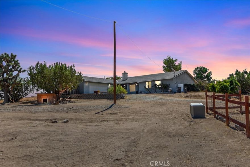 ***Beautifully Renovated Oak Hills Horse Property***



Welcome to this stunning open-concept home featuring gorgeous dark flooring, a cozy wood-burning stove with stone hearth, and ceiling fans throughout**Enjoy spacious rooms filled with natural light and breathtaking views of both the mountains and city lights**



***Just off the kitchen is a sunroom (not included in square footage) perfect for relaxing year-round/Office/Playroom or just that additional square footage that is needed***A massive indoor laundry room with ample cabinetry adds convenience and functionality***



***Situated on a large lot in the highly desirable Snowline School District, this property is ideal for those seeking space and versatility** With fenced areas for goats, pigs, and chickens (complete with a chicken coop), it’s ready for homesteading or hobby farming***There is a fenced yard, mature trees, and wide-open views complete the setting**Bring your toys, animals or big trucks, this one has room for it all!!