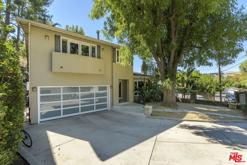 Photo of 21824 San Miguel Street, Woodland Hills, CA 91364 (MLS # 26998133)