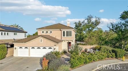 LOCATION, PRIVACY, SPACE Stunning North Chino Hills Home at Premium Cul-de-Sac Location offering scenic views, privacy and lots of indoor and outdoor space. Welcome to your turnkey dream home nestled in one of North Chino Hills' most sought-after neighborhoods! Perfectly positioned on a premium cul-de-sac lot with breathtaking greenbelt and rolling hill views, this beautifully upgraded residence offers the ideal blend of luxury, comfort, and convenience. Step inside to discover a bright and airy interior featuring rich wood flooring, abundant natural light, and a seamless open-concept layout. The formal living and dining areas provide an elegant space for entertaining, while the gourmet dine-in kitchen is complete with crisp white cabinetry, designer tile backsplash, a spacious center island, and top-of-the-line stainless steel Samsung appliances. The kitchen flows effortlessly into the inviting family room, anchored by a dual-sided fireplace and custom entertainment niche—perfect for cozy nights in or lively gatherings. This thoughtfully designed home includes a first-floor bedroom and full bath, ideal for guests or multi-generational living, along with a convenient laundry room. Upstairs, the expansive primary suite is a true retreat, featuring a private balcony with panoramic views, a spa-inspired ensuite bathroom with dual vanities, and a custom walk-in shower. Two additional upstairs bedrooms share a beautifully remodeled full bath, offering plenty of space for family or a home office setup. Step outside to your own private oasis—both the front and backyard have been professionally landscaped with pavers, raised flower beds, and custom lighting. The covered patio, surrounded by lush greenery and mature fruit trees, provides ultimate privacy and creates the perfect setting for outdoor dining and entertaining. Additional upgrades include: Newly remodeled bathrooms with premium materials and fixtures Upgraded double-pane windows for energy efficiency Newer HVAC system, water heater, and water conditioner Ample parking for multiple vehicles Located within the prestigious California Blue Ribbon Distinguished School District, and just minutes from major freeways, shopping, and dining—this home truly has it all. Don’t miss your chance to own this rare gem in North Chino Hills—schedule your private tour today!
