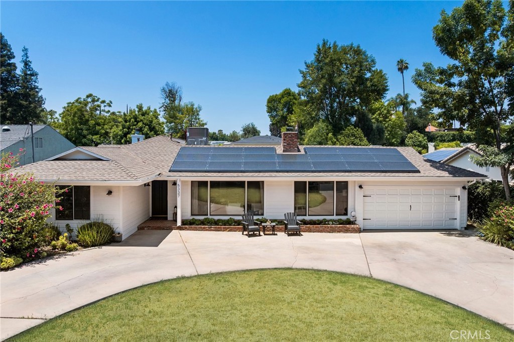 ***FULLY FURNISHED*** Welcome to this beautifully updated and fully furnished single-story home, ideally located south of Ventura Boulevard in the heart of Tarzana. Situated on an expansive, flat 18,000 sq ft lot, this 5-bedroom, 3-bathroom residence was thoughtfully designed for those who love to entertain, offering a seamless flow of indoor and outdoor living. The open-concept kitchen connects effortlessly to the spacious family room with vaulted ceilings and large multislider doors that open to a private backyard oasis. Enjoy summer gatherings with a built-in BBQ, bar seating, and plenty of space to relax or entertain. The oversized rectangular pool is perfect for swimming laps, while the adjacent sports court is ideal for pickleball or basketball enthusiasts.
A gated, oversized horseshoe-shaped driveway provides ample parking, perfect for car collectors or large gatherings. Additional highlights include solar panels for energy efficiency and modern living. This is California living at its finest.