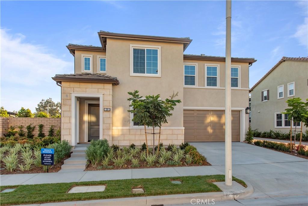 Stunning brand-new 4BR/3BA Toll Brothers home in the highly desirable Vista Rose community, featuring over $100K in luxury upgrades. This corner-lot residence offers exceptional privacy, a bright open floor plan, and upscale finishes throughout. The chef's kitchen boasts quartz countertops, full backsplash, upgraded high-gloss acrylic cabinets to the ceiling, oversized island with breakfast bar, spacious pantry, and a full suite of JennAir appliances including a 42" built-in fridge.
Enjoy full-house luxury vinyl plank flooring, paid-off solar panels, decorative glass stair railing, and custom zebra blinds (to be installed). The dramatic 2-story foyer opens to a spacious Great Room and covered California Room. One full bedroom and bathroom are conveniently located on the first floor perfect for guests or multi-gen living.
Upstairs features a luxurious primary suite with coffered ceiling, spa-inspired bath with soaking tub, frameless glass shower, dual vanities, and a large walk-in closet. Two additional bedrooms share a dual-sink bath, plus a versatile tech loft with built-in desks and an upstairs laundry room with new washer/dryer.
Low-maintenance turf landscaping (coming soon). Soon to be fitted with elegant zebra blinds and a brand-new washer and dryer, the home is positioned on a unique corner lot offering exceptional privacy. Located in the top-rated Placentia-Yorba Linda USD, near Brea Mall, La Floresta, dining, and freeways.