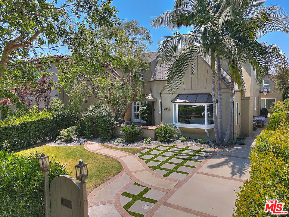 Welcome to a rare and remarkable 6-bedroom, 5-bathroom gated residence for lease in the heart of Westwood, located within the highly sought-after Westwood Charter School district. Nestled on a peaceful tree-lined street, this expansive home offers a perfect blend of elegance, comfort, and connected living. The main level is thoughtfully designed for both everyday moments and vibrant entertaining, featuring multiple living areas that flow seamlessly into a stunning chef's kitchen with top-tier appliances and a spacious walk-in pantry. The layout encourages connection while still offering quiet retreats, including a luxurious primary suite with skyline views from your private balcony, walk-in closets, and spa-style bath. Each of the six bedrooms offers flexibility for family, guests, or work-from-home needs. Step outside to your own private oasis, where a sparkling pool and spa invite relaxation and gatherings under the California sun. Offered furnished and turnkey, this home is move-in ready with its secure gated entry. This home delivers privacy, scale, and unmatched location just minutes from UCLA, Century City, Beverly Hills, local parks, and shops. A truly exceptional lease offering in one of LA's most beloved neighborhoods.