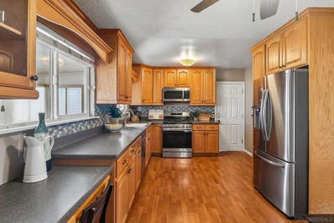 Photo of 13416 Ripple LN, Lakeside, CA 92040 (MLS # 260019255SD)